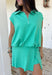 This shamrock green two piece set is the sporty-chic moment your summer wardrobe needs! Designed for days on the go, this athleisure set blends comfort and style in the cutest way. The short sleeve top features a collared neckline with white scalloped embroidered trim and a quarter zip for that polished, elevated feel, while the elastic hem keeps it flattering and easy. The matching skort adds a playful touch with coordinating scalloped trim and built-in comfort for all-day wear. 