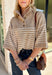 Classic stripes and cozy comfort come together in this effortlessly stylish sweater from Entro. Designed in a warm camel hue with timeless off-white stripes, this short sleeve sweater is the perfect blend of polished and comfortable. The mock neckline gives it a sophisticated touch, while the decorative button detail at the front adds just the right amount of charm. Finished with ribbed trim and a soft, cozy knit, this versatile top is perfect for everything from workdays to weekend coffee dates.
