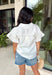 This white ruffle sleeve top is such an effortlessly polished piece for summer! The pearl trim detail adds the prettiest, elevated touch, while the ruffle sleeves bring in a soft, feminine feel. Designed with a classic collared neckline and button front, it’s the perfect mix of timeless and fresh. Lightweight with a hint of stretch, it’s comfortable enough for all-day wear while still looking put together. Whether you're heading to work, brunch, or a casual dinner, this top makes styling so easy. 