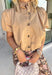 Simple, polished, and effortlessly chic, this tan button down top is a staple you'll wear all fall long. Crafted from breathable cotton, this timeless top features a modern bubble hem that creates a flattering silhouette with little effort. The band collar and button front add a tailored touch, while the short puff sleeves bring just the right amount of feminine charm. 