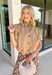 Simple, polished, and effortlessly chic, this tan button down top is a staple you'll wear all fall long. Crafted from breathable cotton, this timeless top features a modern bubble hem that creates a flattering silhouette with little effort. The band collar and button front add a tailored touch, while the short puff sleeves bring just the right amount of feminine charm. 