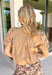 Simple, polished, and effortlessly chic, this tan button down top is a staple you'll wear all fall long. Crafted from breathable cotton, this timeless top features a modern bubble hem that creates a flattering silhouette with little effort. The band collar and button front add a tailored touch, while the short puff sleeves bring just the right amount of feminine charm. 
