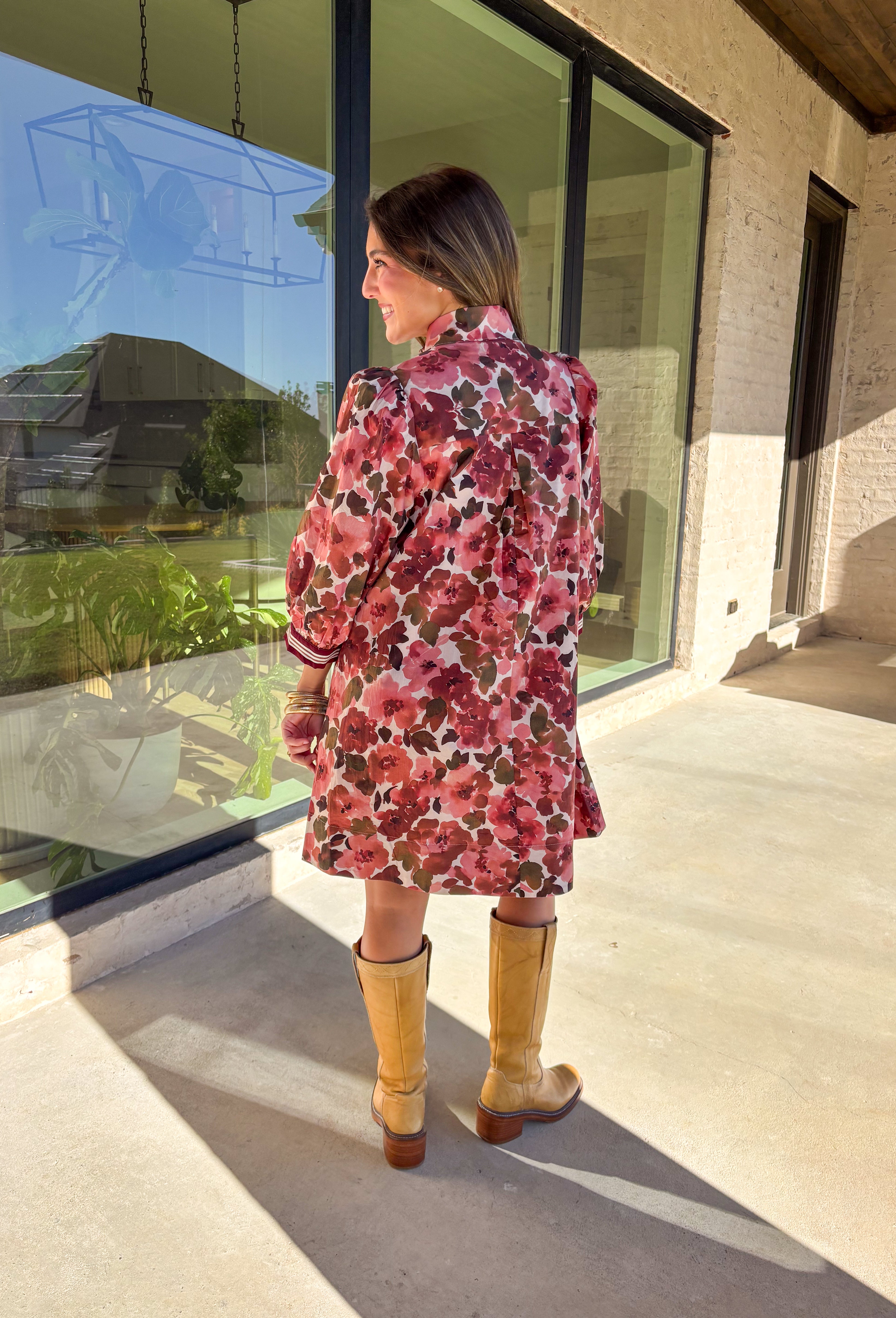 This floral dress by Entro is the perfect mix of playful and polished. Designed in rich shades of wine, it features puff sleeves and a striped trim collar and cuffs that add a sporty yet feminine touch. The patch pockets at the front bring in a bit of practicality, while the soft cotton fabric and full lining keep it comfortable and easy to wear. A fun fall piece that transitions seamlessly from weekday wear to weekend outings.