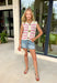 This lightweight knit stripe sweater tank is the perfect soft and feminine piece for summer! The off white base with light pink stripes keeps it fresh and easy to style, while the oversized gold textured buttons add the prettiest elevated detail. With front pockets and a cozy, breathable knit feel, it’s that perfect mix of polished and relaxed. It’s an easy go-to for everything from casual days to lunch plans—just pair it with denim or shorts and you’re set. 