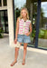 This lightweight knit stripe sweater tank is the perfect soft and feminine piece for summer! The off white base with light pink stripes keeps it fresh and easy to style, while the oversized gold textured buttons add the prettiest elevated detail. With front pockets and a cozy, breathable knit feel, it’s that perfect mix of polished and relaxed. It’s an easy go-to for everything from casual days to lunch plans—just pair it with denim or shorts and you’re set. 
