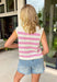 This lightweight knit stripe sweater tank is the perfect soft and feminine piece for summer! The off white base with light pink stripes keeps it fresh and easy to style, while the oversized gold textured buttons add the prettiest elevated detail. With front pockets and a cozy, breathable knit feel, it’s that perfect mix of polished and relaxed. It’s an easy go-to for everything from casual days to lunch plans—just pair it with denim or shorts and you’re set. 