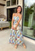 Romantic and effortlessly graceful, this cream strapless midi dress by Entro is made for special warm weather moments. Featuring a beautiful floral print with strawberries throughout, it’s designed with pleated detailing along the chest for a flattering shape and a smocked back for added comfort and flexibility. Side pockets add a practical touch, while the fully lined cotton fabric keeps it light and breathable. This will quickly become a favorite!