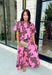 Add a fresh pop of color to your fall wardrobe with this charming floral top that's as versatile as it is pretty! Designed in a beautiful pink hue with a rich brown floral print, this lightweight cotton blouse brings the perfect blend of feminine style and everyday comfort. Wear it with the coordinating skirt for an effortlessly polished matching set, or style it on its own with your favorite denim or trousers for endless outfit possibilities.