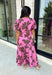 Add a fresh pop of color to your fall wardrobe with this charming floral top that's as versatile as it is pretty! Designed in a beautiful pink hue with a rich brown floral print, this lightweight cotton blouse brings the perfect blend of feminine style and everyday comfort. Wear it with the coordinating skirt for an effortlessly polished matching set, or style it on its own with your favorite denim or trousers for endless outfit possibilities.