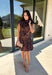 Leopard gets a dressed-up update with this satin dress from THML. The smooth satin fabric gives the classic animal print a little extra shine, making it a fun choice as fall events start giving way to holiday parties and seasonal celebrations. A draped mock neckline creates a flattering focal point, while the short sleeves keep the silhouette simple and easy to accessorize. A keyhole closure at the back adds a pretty finishing detail, and the fully lined design provides comfortable coverage. 