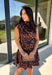 Leopard gets a dressed-up update with this satin dress from THML. The smooth satin fabric gives the classic animal print a little extra shine, making it a fun choice as fall events start giving way to holiday parties and seasonal celebrations. A draped mock neckline creates a flattering focal point, while the short sleeves keep the silhouette simple and easy to accessorize. A keyhole closure at the back adds a pretty finishing detail, and the fully lined design provides comfortable coverage. 