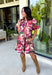 Rich color and feminine details make this floral dress a standout for the season. Designed in a gorgeous wine hue with a beautiful floral print, this dress is effortlessly charming from every angle. The button-front design, soft puff sleeves, and flirty ruffle hem create a timeless silhouette, while the lightweight cotton fabric and fully lined construction keep it comfortable for all-day wear. 