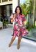 Rich color and feminine details make this floral dress a standout for the season. Designed in a gorgeous wine hue with a beautiful floral print, this dress is effortlessly charming from every angle. The button-front design, soft puff sleeves, and flirty ruffle hem create a timeless silhouette, while the lightweight cotton fabric and fully lined construction keep it comfortable for all-day wear. 