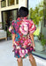 Rich color and feminine details make this floral dress a standout for the season. Designed in a gorgeous wine hue with a beautiful floral print, this dress is effortlessly charming from every angle. The button-front design, soft puff sleeves, and flirty ruffle hem create a timeless silhouette, while the lightweight cotton fabric and fully lined construction keep it comfortable for all-day wear. 