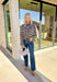 Sleek meets laid-back in these dark wash slim wide jeans from Vervet. The flattering high-rise fit and straight-but-wide leg shape make them an easy choice for pairing with everything from cozy sweaters to tailored blouses. The raw edge hem adds a touch of casual edge, perfect for dressing up or down. With a soft cotton blend and a hint of stretch, they’re comfortable enough for all-day wear while still holding their shape—your new go-to denim for the season.