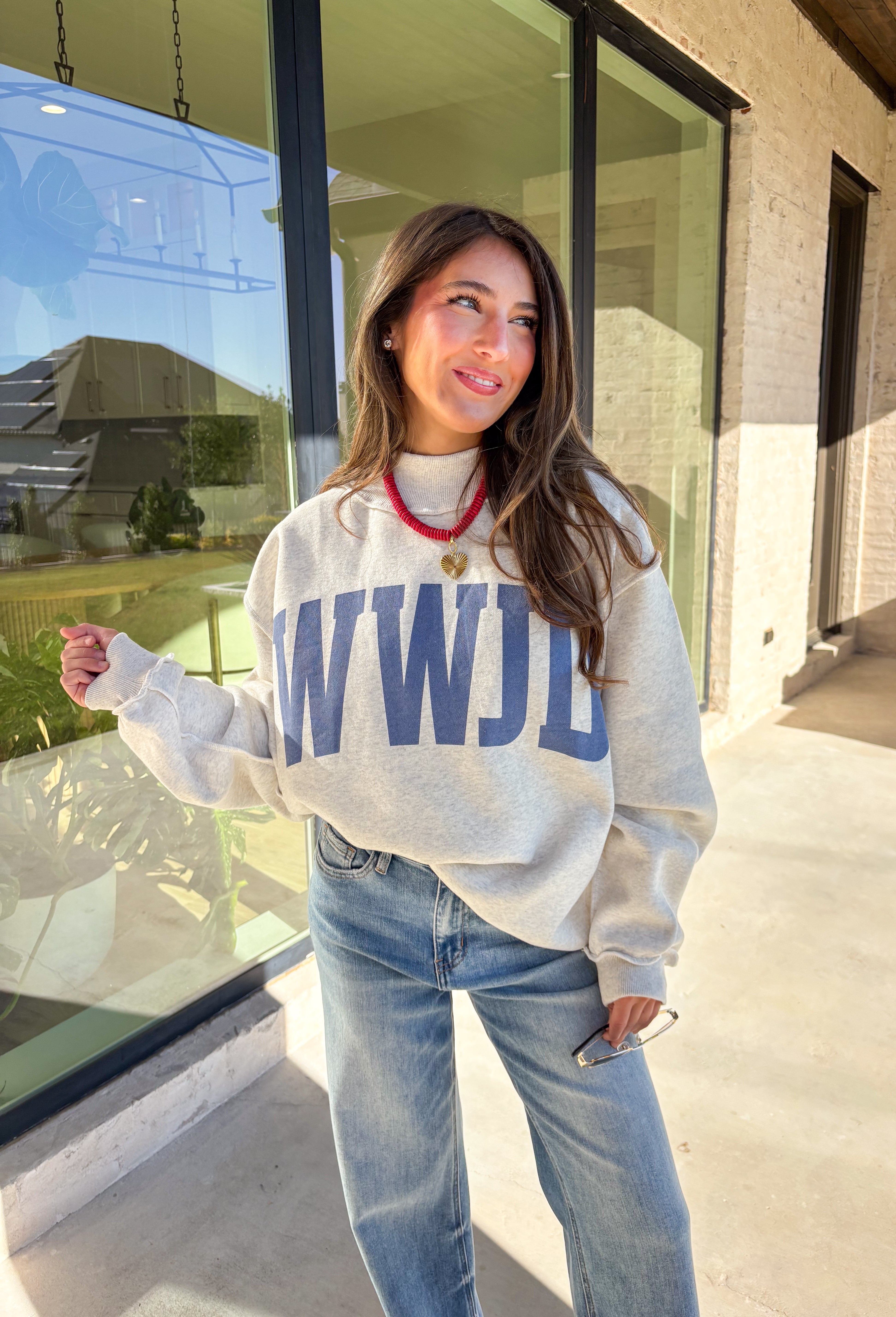 This pullover is giving cozy Sunday vibes — whether you’re headed to church, coffee with a friend, or just lounging with your fam. The reversible design makes it twice as good (literally!). One side reads “WWJD” and the other says “Amen,” so you can wear your faith however you’re feeling that day. Soft, warm, and made for chill fall moments, this one’s bound to be on repeat all season long!