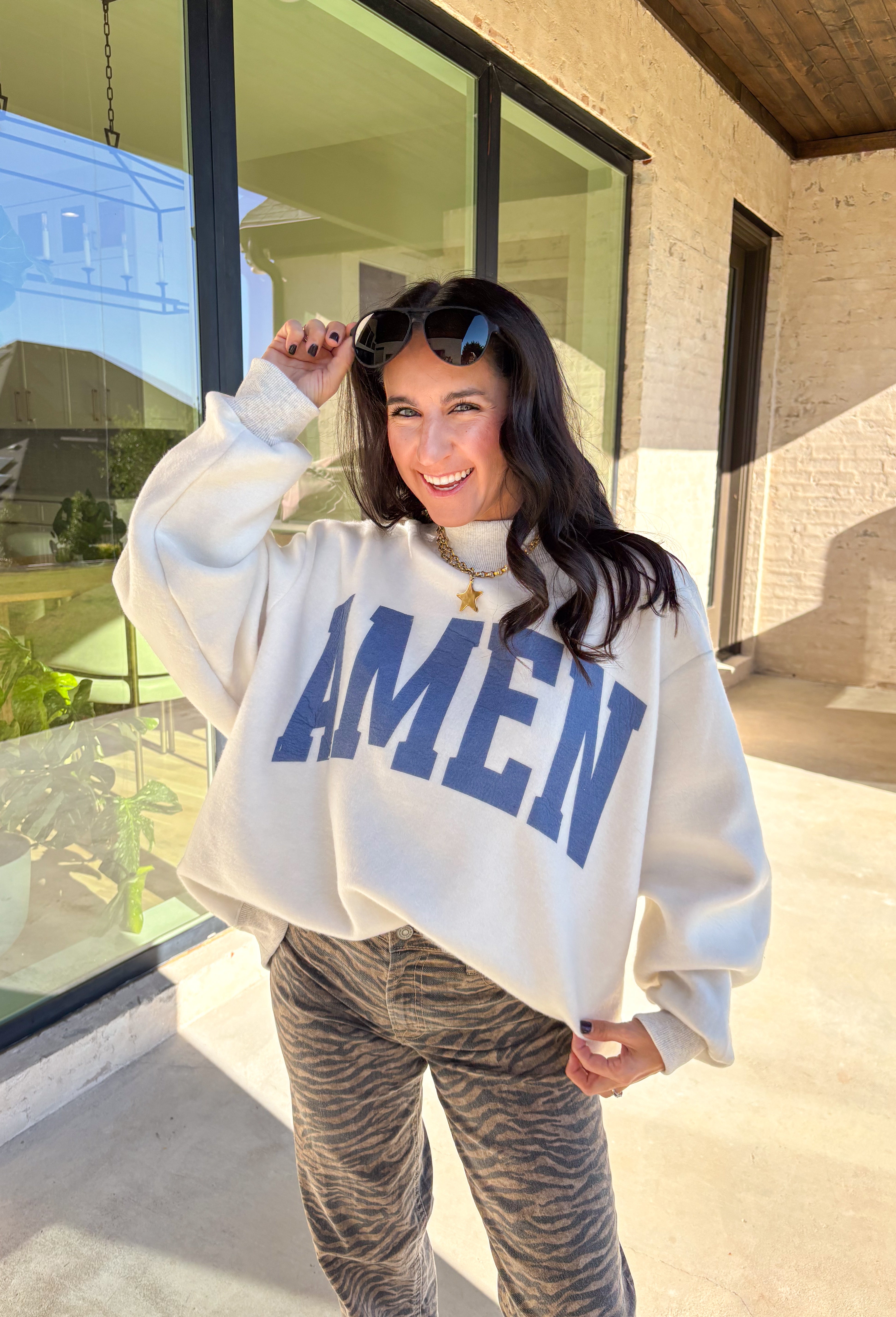 This pullover is giving cozy Sunday vibes — whether you’re headed to church, coffee with a friend, or just lounging with your fam. The reversible design makes it twice as good (literally!). One side reads “WWJD” and the other says “Amen,” so you can wear your faith however you’re feeling that day. Soft, warm, and made for chill fall moments, this one’s bound to be on repeat all season long!