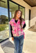 Get bundled up in cuteness with this cozy pink and white plaid vest! With sweet pops of black in the pattern and darling pink bow ties on each side, it brings just the right amount of charm to your cold-weather wardrobe. Whether you're layering it over a long sleeve tee or a chunky knit sweater, this vest is ready to warm things up in the coziest way.