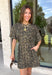 Leopard print is always in style, especially for fall! This olive dress brings together a timeless animal print with an effortlessly flattering silhouette you'll love wearing all season long. The adjustable drawstring waist lets you customize the fit, while the soft fabric keeps it comfortable from morning to night. Finished with short sleeves and everyone's favorite feature—side pockets—this dress is perfect for everything from coffee dates and shopping trips to game days and weekend adventures. 