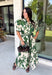 Classic florals and thoughtful details make this midi dress a standout for the season. Designed with a soft cream backdrop and an olive floral print, this beautifully feminine dress is perfect for everything from brunch dates to family gatherings. Delicate pleating along the neckline and collar adds elegant texture, while the matching self-tie belt creates a flattering, customizable silhouette. 
