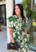 Classic florals and thoughtful details make this midi dress a standout for the season. Designed with a soft cream backdrop and an olive floral print, this beautifully feminine dress is perfect for everything from brunch dates to family gatherings. Delicate pleating along the neckline and collar adds elegant texture, while the matching self-tie belt creates a flattering, customizable silhouette. 