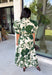 Classic florals and thoughtful details make this midi dress a standout for the season. Designed with a soft cream backdrop and an olive floral print, this beautifully feminine dress is perfect for everything from brunch dates to family gatherings. Delicate pleating along the neckline and collar adds elegant texture, while the matching self-tie belt creates a flattering, customizable silhouette. 
