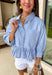 This light blue babydoll top is basically spring in outfit form! With soft pale yellow and white stripes, a classic collared neckline, and a button-down front, it’s the perfect mix of polished and playful. The babydoll silhouette gives you that easy, floaty fit we all love—cute, comfy, and made for sunny days. Finished with a sweet ruffle hem, it’s the kind of top you’ll throw on with denim shorts, white jeans for an effortless, breezy look.