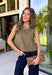 Give your everyday wardrobe a polished update with this effortlessly stylish sleeveless denim top from Entro. Designed in a rich olive denim, this versatile piece features eye-catching gold hardware accent front flap details that add the perfect touch of utility-inspired charm. The clean sleeveless silhouette makes it ideal for layering under jackets and cardigans or wearing on its own.
