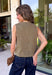 Give your everyday wardrobe a polished update with this effortlessly stylish sleeveless denim top from Entro. Designed in a rich olive denim, this versatile piece features eye-catching gold hardware accent front flap details that add the perfect touch of utility-inspired charm. The clean sleeveless silhouette makes it ideal for layering under jackets and cardigans or wearing on its own.