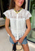 This white floral eyelet lace top is the definition of a timeless summer staple! The delicate eyelet detail adds beautiful texture, while the button down design keeps it classic and easy to style. Lightweight and breathable in 100% cotton, it’s perfect for warm days when you want to feel polished without overthinking it. Whether you're heading to brunch, work, or a casual outing, this top pairs effortlessly with everything from denim shorts to skirts. 