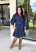 A timeless denim dress is always in style, and this lightweight beauty from Entro is one you'll wear on repeat. Crafted from soft medium wash tencel denim, this effortlessly flattering dress features a classic button-front design, a feminine v-neckline, and a matching self-tie waist that creates the perfect customizable fit. The ¾ length sleeves with button cuffs add a polished touch, while side pockets make it as practical as it is stylish. 