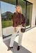 A timeless leopard print never goes out of style, and this cozy sweater is one you'll be reaching for all season long. Designed with a classic leopard pattern and an effortlessly chic mock neckline, this sweater combines bold style with everyday comfort. The ultra-soft knit feels cozy without being too heavy, making it perfect for layering through the cooler months. 