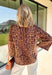 A timeless leopard print never goes out of style, and this cozy sweater is one you'll be reaching for all season long. Designed with a classic leopard pattern and an effortlessly chic mock neckline, this sweater combines bold style with everyday comfort. The ultra-soft knit feels cozy without being too heavy, making it perfect for layering through the cooler months. 