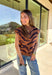 A little wild, a lot cozy—this camel short sleeve sweater is the perfect blend of chic and playful. Designed with a bold tiger stripe print, it features a mock neckline and a relaxed silhouette for easy, comfortable wear. This sweater is a versatile piece that can be styled for both casual days and polished evenings.