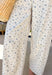 A fresh twist on your favorite relaxed denim! These neutral barrel jeans feature the sweetest dainty blue floral print throughout, giving them a soft, feminine feel while still keeping that laid-back, on-trend silhouette. The barrel leg shape creates a modern, slightly tapered look that feels both comfortable and stylish. An elastic back waistband adds a touch of stretch for an easy fit, while the cotton denim keeps them structured and breathable. They’re the perfect mix of playful and effortless.