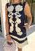 This navy dress is the perfect blend of timeless charm and fall-ready style! Delicate cream floral embroidery adds a beautiful handcrafted touch, while the matching contrast hem creates a polished finish that makes this dress stand out. Designed with a flattering sleeveless silhouette, back zipper closure, and side pockets (because we know they're a favorite!), it's as practical as it is stylish. 