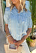 Meet your new spring staple. This lightweight chambray button down is the definition of easy, effortless style. Crafted from ultra-soft tencel, it has that perfectly broken-in feel from the very first wear—light, breathable, and ideal for sunny days ahead. Soft gathered shirring across the yoke adds a subtle feminine touch while creating a flowy silhouette that drapes beautifully without clinging. 