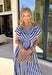 Say hello to your new spring go-to! This royal blue and white striped midi dress by Umgee is giving all the crisp, sunny-day vibes with a classic button down look that feels effortless and put-together. The bold stripes keep it timeless, while the midi length makes it easy to dress up or down for everything from brunch plans to weekend errands. It features fabricated buttons for that polished finish, plus elastic in the back for a comfy, flattering fit that moves with you.