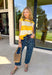 This sleeveless off white and yellow striped top by Wishlist is the perfect little piece to brighten up your spring wardrobe! The bold stripe pattern feels fresh and cheerful, and the sleeveless cut makes it an easy grab for warm days, weekend plans, or layering under a light jacket when the mornings are still a little chilly. Lightweight and easy to style, this top pairs perfectly with denim shorts, white jeans, or a cute skirt for a simple outfit that still feels fun and put-together. 