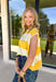 This sleeveless off white and yellow striped top by Wishlist is the perfect little piece to brighten up your spring wardrobe! The bold stripe pattern feels fresh and cheerful, and the sleeveless cut makes it an easy grab for warm days, weekend plans, or layering under a light jacket when the mornings are still a little chilly. Lightweight and easy to style, this top pairs perfectly with denim shorts, white jeans, or a cute skirt for a simple outfit that still feels fun and put-together. 