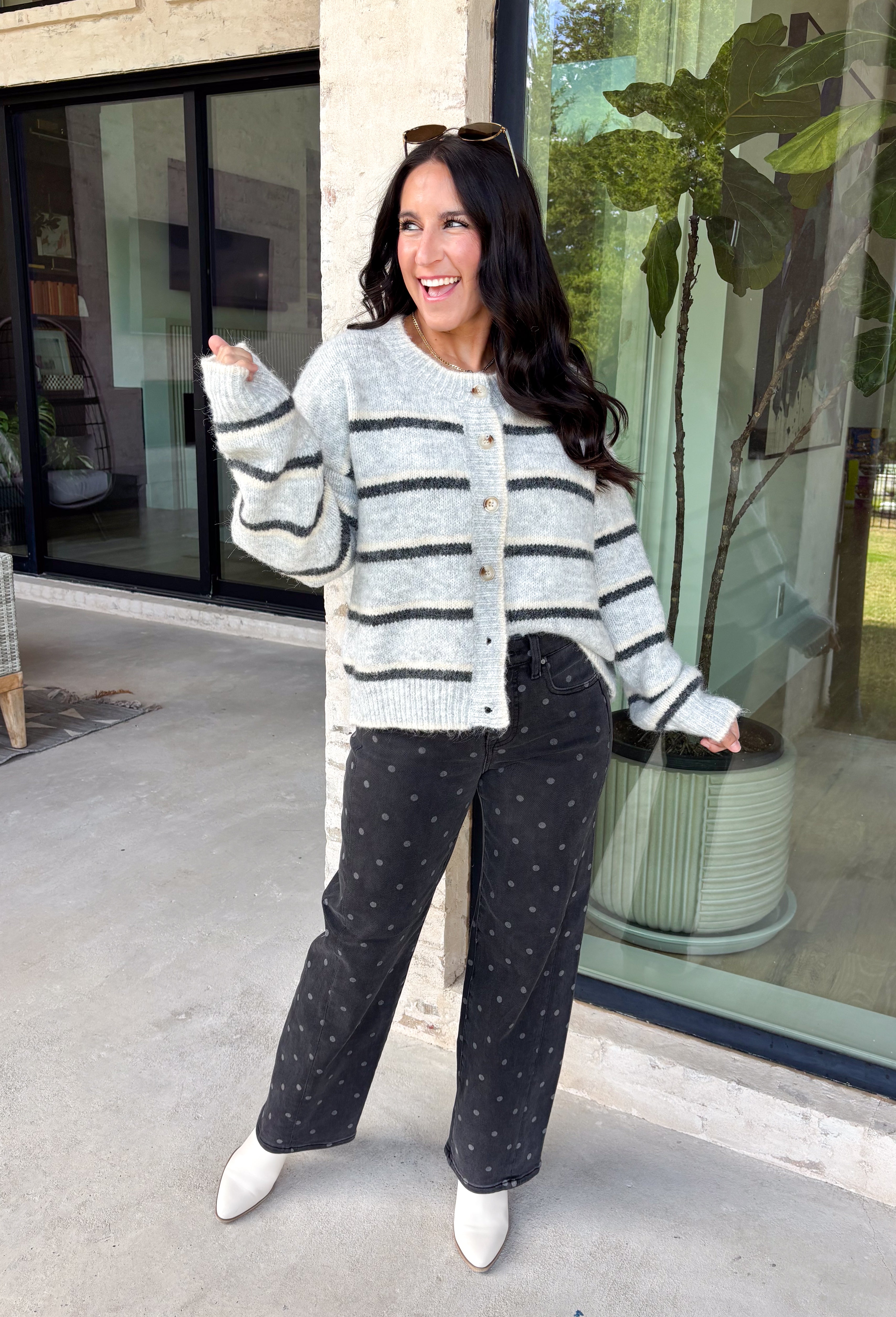 Cozy up in timeless style with this beautiful cardigan from Hyfve. Designed in a soft light gray knit with classic black and cream stripes, this button-down sweater is the perfect layering piece for the season. Ribbed detailing throughout adds texture and a polished finish, while the ultra-soft knit blend keeps you warm and comfortable without feeling bulky. Whether you wear it buttoned as a sweater or layered over your favorite basics, this versatile cardigan is one you'll reach for again and again.