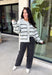 Cozy up in timeless style with this beautiful cardigan from Hyfve. Designed in a soft light gray knit with classic black and cream stripes, this button-down sweater is the perfect layering piece for the season. Ribbed detailing throughout adds texture and a polished finish, while the ultra-soft knit blend keeps you warm and comfortable without feeling bulky. Whether you wear it buttoned as a sweater or layered over your favorite basics, this versatile cardigan is one you'll reach for again and again.