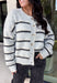 Cozy up in timeless style with this beautiful cardigan from Hyfve. Designed in a soft light gray knit with classic black and cream stripes, this button-down sweater is the perfect layering piece for the season. Ribbed detailing throughout adds texture and a polished finish, while the ultra-soft knit blend keeps you warm and comfortable without feeling bulky. Whether you wear it buttoned as a sweater or layered over your favorite basics, this versatile cardigan is one you'll reach for again and again.