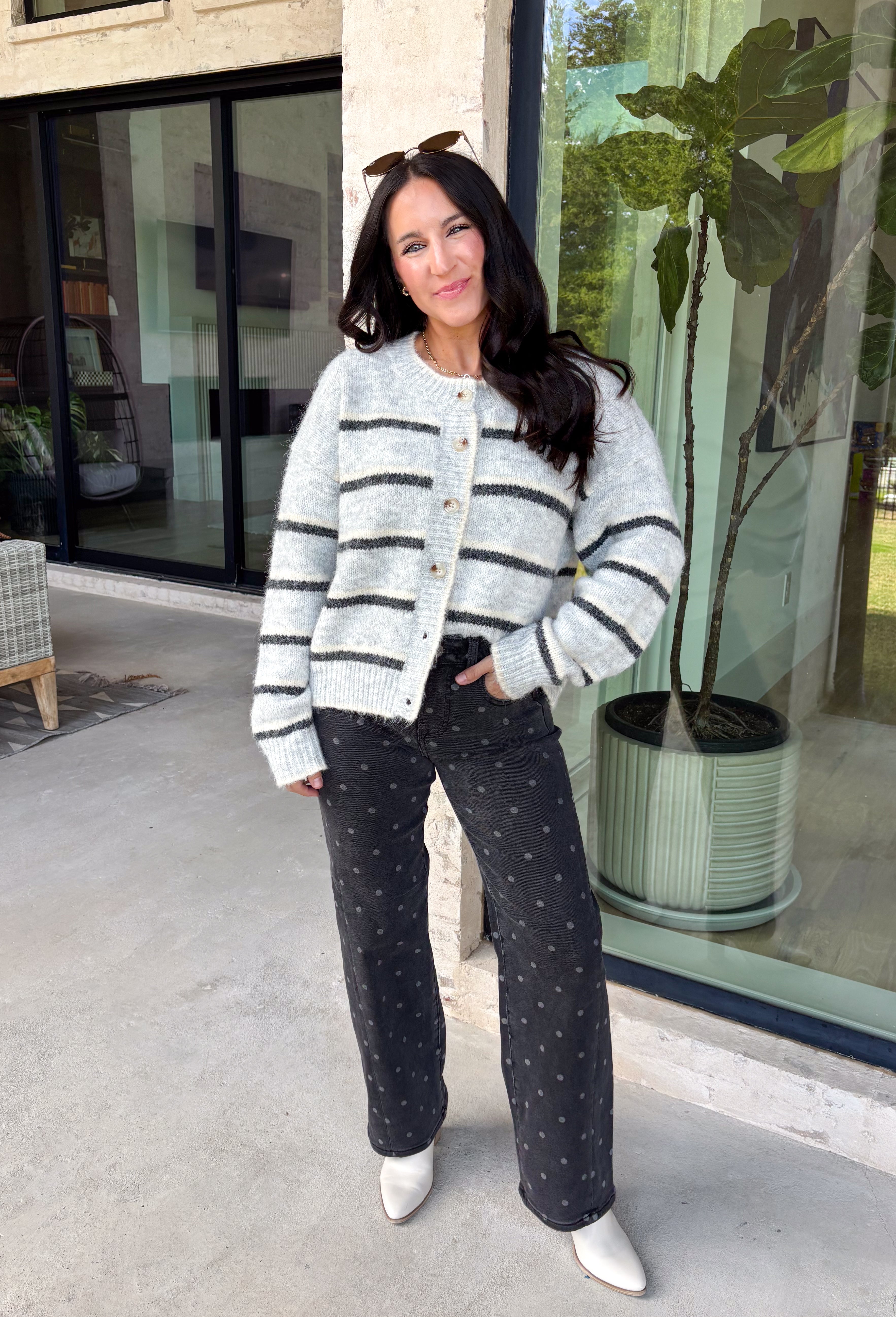 Cozy up in timeless style with this beautiful cardigan from Hyfve. Designed in a soft light gray knit with classic black and cream stripes, this button-down sweater is the perfect layering piece for the season. Ribbed detailing throughout adds texture and a polished finish, while the ultra-soft knit blend keeps you warm and comfortable without feeling bulky. Whether you wear it buttoned as a sweater or layered over your favorite basics, this versatile cardigan is one you'll reach for again and again.