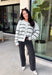 Cozy up in timeless style with this beautiful cardigan from Hyfve. Designed in a soft light gray knit with classic black and cream stripes, this button-down sweater is the perfect layering piece for the season. Ribbed detailing throughout adds texture and a polished finish, while the ultra-soft knit blend keeps you warm and comfortable without feeling bulky. Whether you wear it buttoned as a sweater or layered over your favorite basics, this versatile cardigan is one you'll reach for again and again.