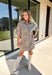 Take a walk on the playful side of fall with this mocha denim dress from New In. The warm mocha shade is covered in an ivory fawn-inspired spotted print, giving classic denim an unexpected woodland twist that’s perfect for the season. A collared neckline and front button closure keep the silhouette classic, while short sleeves make it a great pick for warmer autumn afternoons. Front pockets add a casual, functional touch and complement the denim construction.