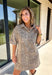 Take a walk on the playful side of fall with this mocha denim dress from New In. The warm mocha shade is covered in an ivory fawn-inspired spotted print, giving classic denim an unexpected woodland twist that’s perfect for the season. A collared neckline and front button closure keep the silhouette classic, while short sleeves make it a great pick for warmer autumn afternoons. Front pockets add a casual, functional touch and complement the denim construction.