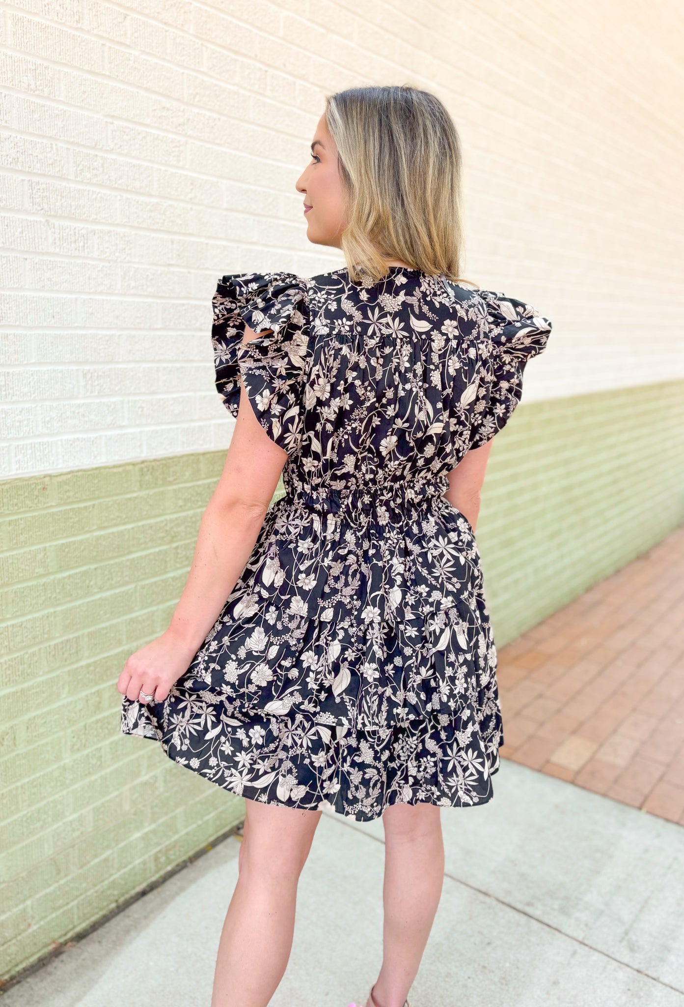 Around Downtown Floral Dress, black, tan and cream floral ruffle sleeve dress with ruffle tiering and cinching at the waist