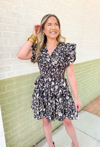 Around Downtown Floral Dress, black, tan and cream floral ruffle sleeve dress with ruffle tiering and cinching at the waist