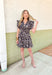 Around Downtown Floral Dress, black, tan and cream floral ruffle sleeve dress with ruffle tiering and cinching at the waist